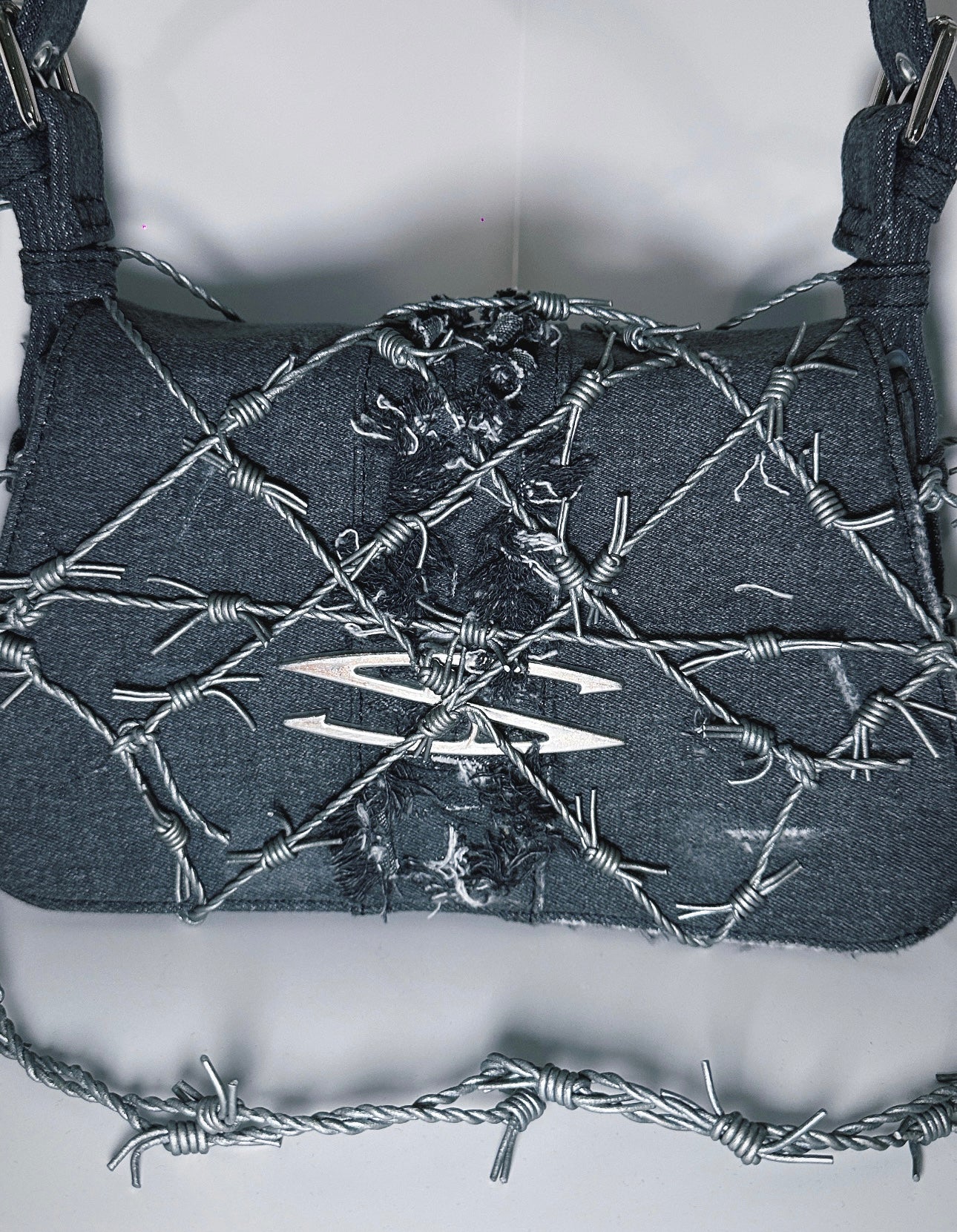 LIMITED XXX 007 - BARBED WIRE BAG