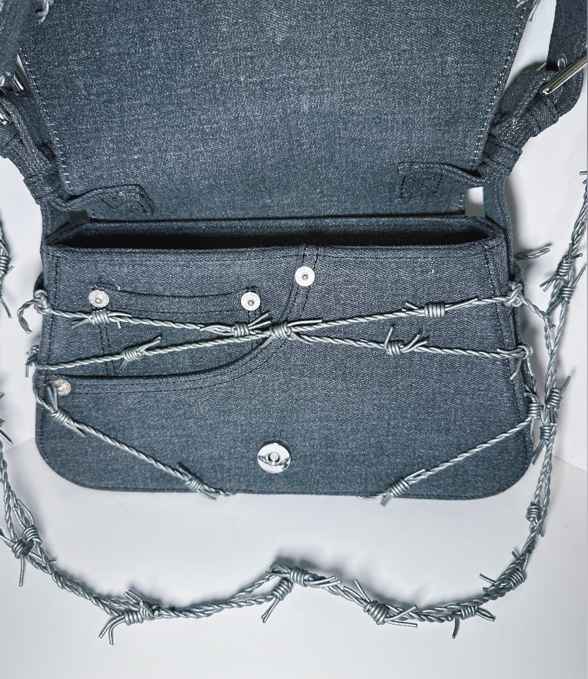 LIMITED XXX 007 - BARBED WIRE BAG